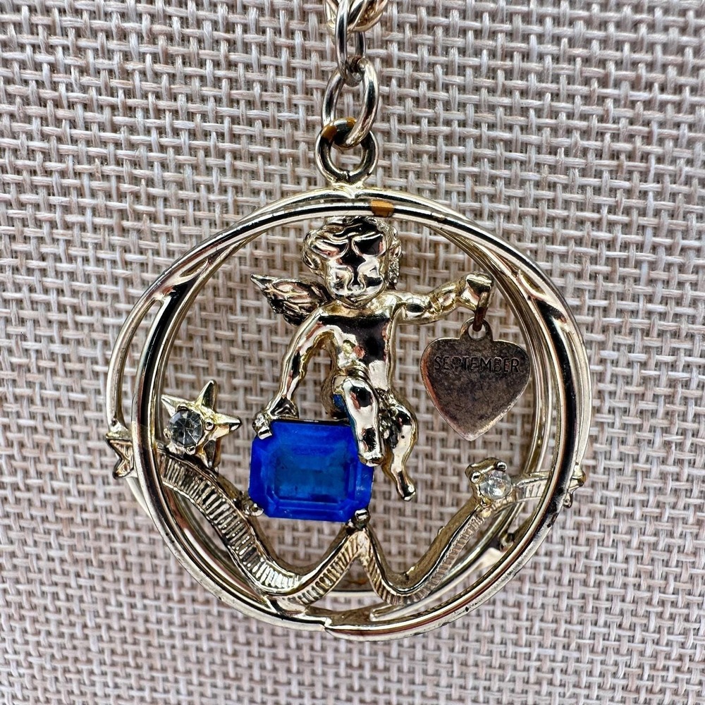 Vintage 80s September Birthstone Angel Pendant Necklace Blue Crystal Charm Gold
